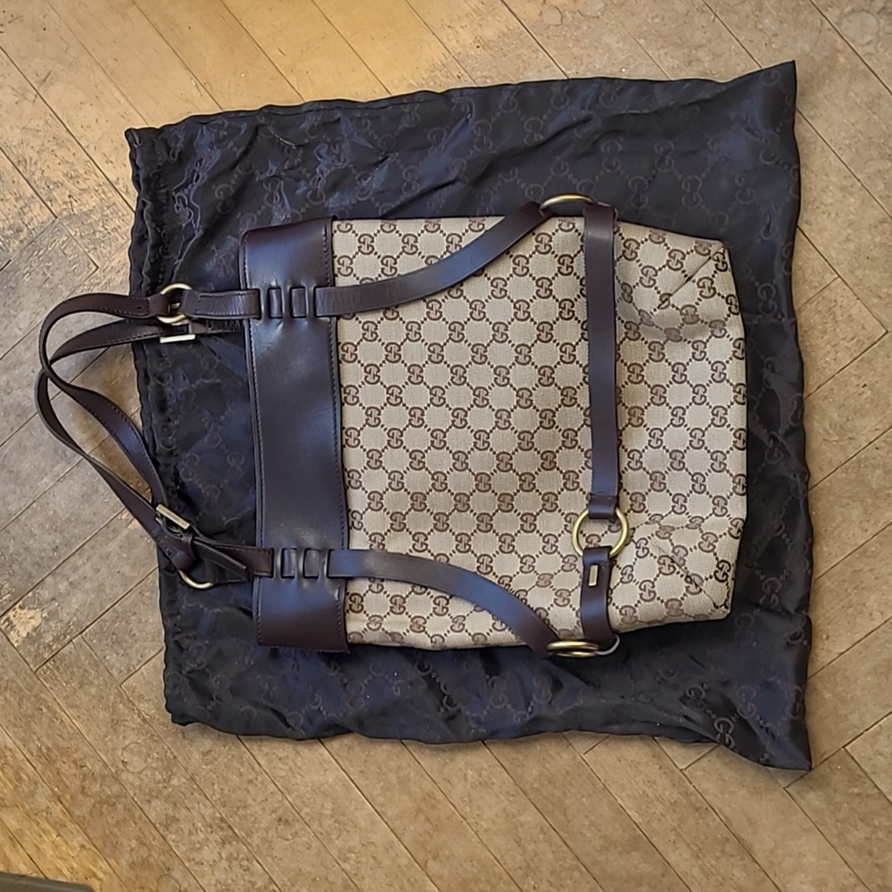 Gucci monogram bucket bag with dark brown trim